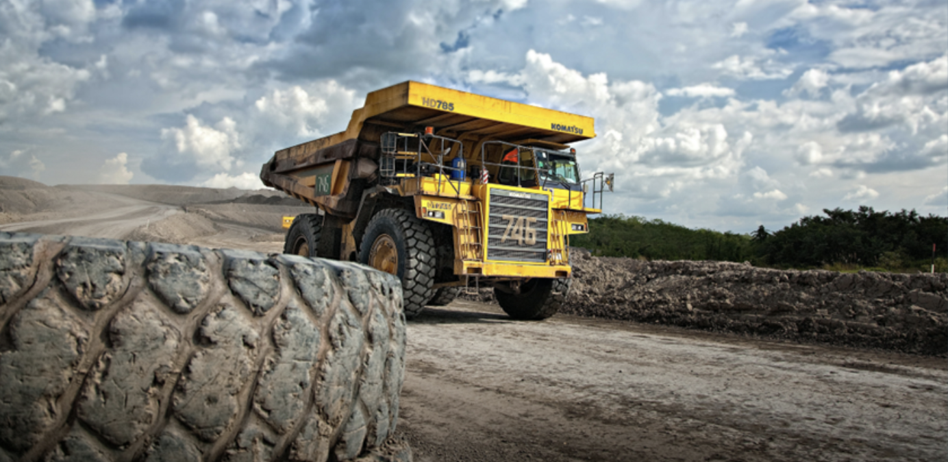 A massive dump truck in action at a mining site. Neurapulse identifies risks and ensures operator safety with quick and effective cognitive testing.